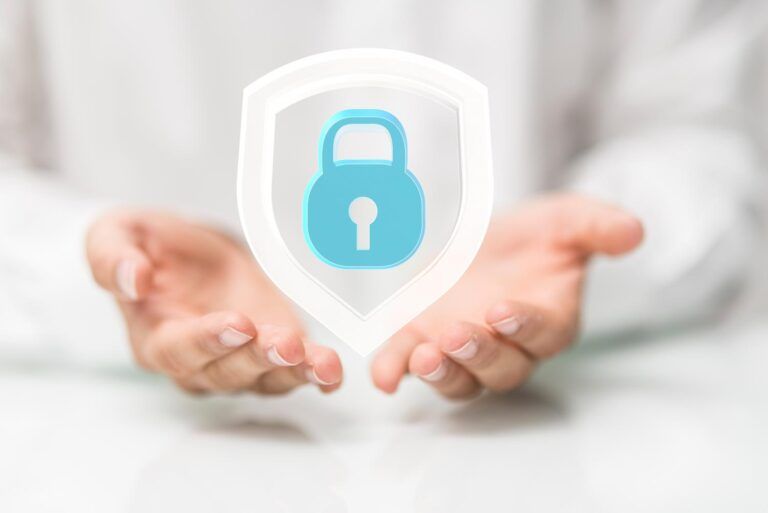 A pair of hands cupped underneath a security padlock shield graphic.