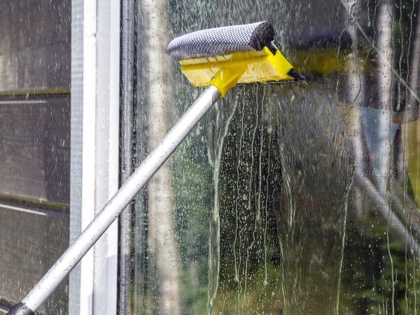 Eximm cleaning services include window cleaning for residential and commercial properties