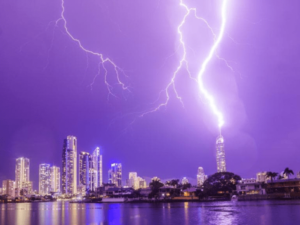 Storm weather with lightning striking a Gold Coast building.