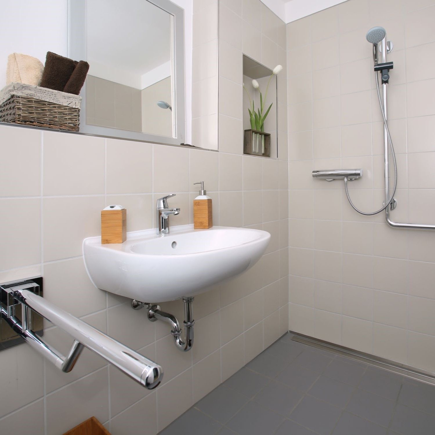 Wheelschair ramp with steel handrails.